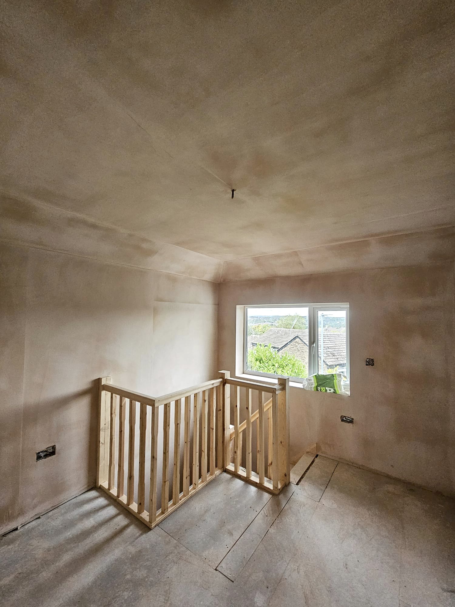 Loft conversion landing - walls and ceiling skimmed by D Whitley Plastering